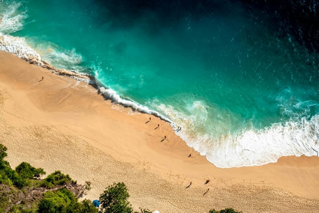 Nusa Dua is a resort area built in the 1970s in the southern part of Bali, Indonesia. Known as an enclave of large five-star resorts, it covers 350 hectares of land and encloses more than 20 resorts.